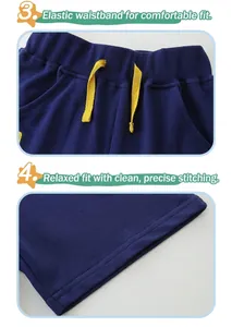 Detail showing elastic waistband with yellow drawstring and double stitching on blue shorts