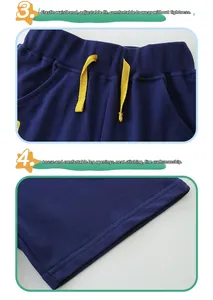 Detail showing elastic waistband with yellow drawstring and double stitching on blue shorts