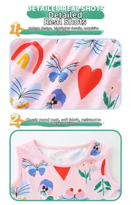 Close-up of cotton girl's dress fabric with rainbow and butterfly print details