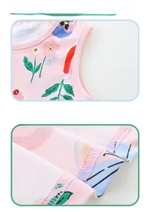 Detailed view of the soft pink cotton floral top showing high-quality stitching and hemming