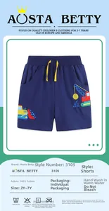 Detail of dark blue 100% cotton kids shorts with colorful excavator embroidery