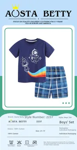 Detail of boys' navy astronaut cotton T-shirt and plaid shorts with size chart
