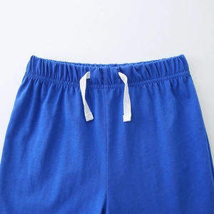 Boys royal blue knit cotton shorts with elastic waistband and white drawstring detail