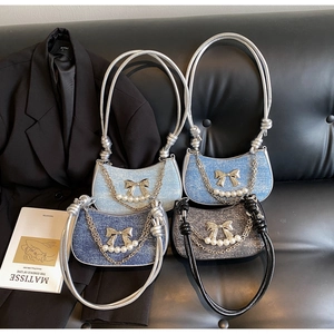 Chic crescent bags with sparkling fabric, metal bows, and elegant pearl chains
