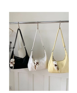 Three large capacity crescent shoulder bags in black, white and yellow with bear charms