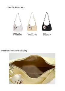 Detail view of crocodile-patterned hobo bags with interior storage and bear charms