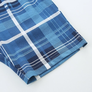 Boys short sleeve plaid set featuring classic blue tartan pattern cotton knit fabric