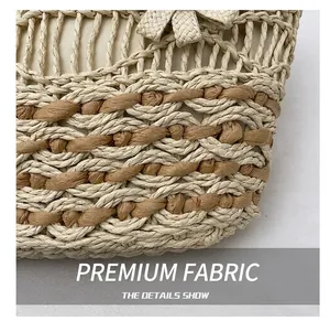 Close-up of woven straw tote texture with beige fabric lining and detailed handcrafting