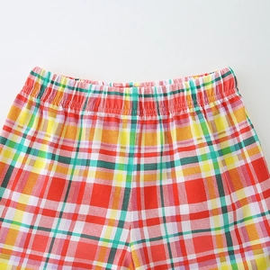 Colorful plaid cotton shorts for girls featuring elastic waistband and vibrant summer patterns