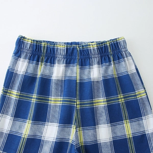 Boys summer cotton sports set featuring blue and yellow plaid shorts with elastic waist