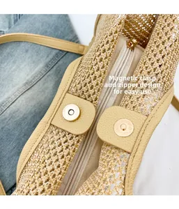 Détail du sac cabas évidé montrant le fermoir magnétique et la fermeture éclair de sécurité
