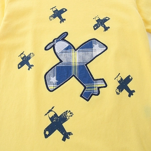 Boys yellow cotton t-shirt set featuring blue checkered airplane patchwork details
