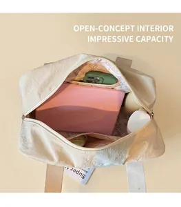 Top view of spacious nylon tote interior with zipper pocket and large capacity