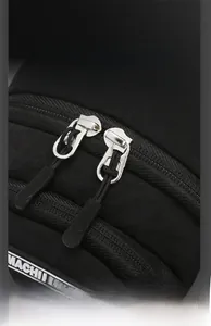 Detail of high-density nylon fabric with durable dual metal zippers and brand logo