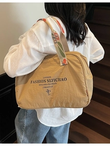 Khaki nylon tote bag with floral embroidered handles and large storage space for women