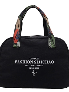 Large black nylon travel tote bag with London print and colorful woven handles for women