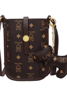 Vintage brown crossbody phone bag with bear prints and a small dog charm pendant