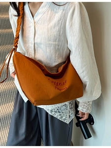 Caramel brown canvas tote bag with pleated shoulder strap and large capacity