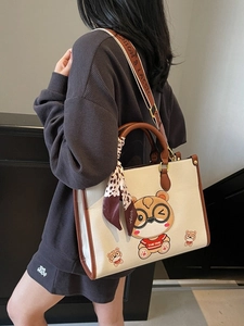 Chic cream and brown tote bag with cartoon bear pattern and leopard print scarf