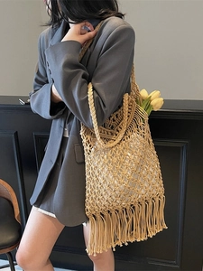 Bohemian macrame tote bag with fringe and hollow woven pattern for beach vacation style