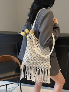 Bohemian macrame tote bag with long fringe tassels and thick woven shoulder strap