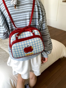 Blue and white plaid tote backpack with red apple patch and Not Anxious embroidery