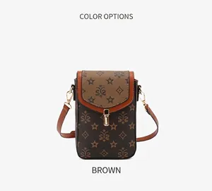 Macro shot of coffee brown PU leather shoulder bag with gold metal buckle and star prints