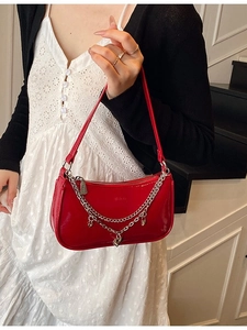Fashionable red patent leather baguette bag with silver heart chain strap for women