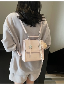 Minimalist light pink PU leather mini backpack with star studs and plush bear charm