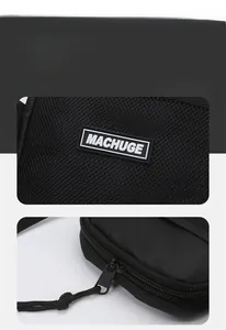Detail of mesh fabric bag showing rubber brand logo and sturdy metal zipper puller