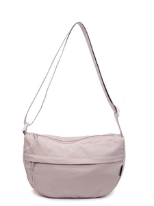 Pink nylon crescent crossbody bag with adjustable strap and multi-zippered compartments