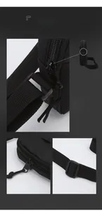 Detail of smooth zipper and adjustable strap buckle on a black crossbody bag