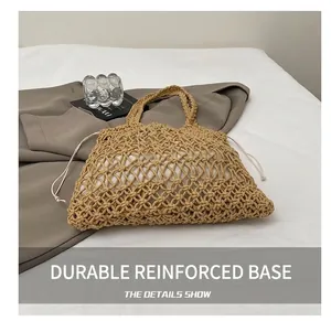 Detail of hollow woven cotton bag with white drawstring liner on a clean surface