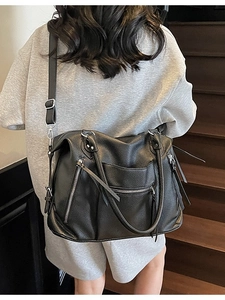 Vintage large black leather tote bag with tassel zippers and adjustable strap for women