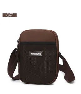 Detail of coffee brown crossbody bag with black mesh pocket and logo on white background