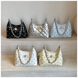 Close-up of quilted shoulder bags with star logo and chunky silver chain in five colors