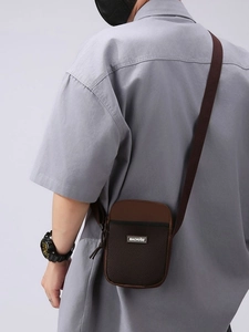 Brown and black拼接 compact crossbody bag with adjustable shoulder strap for daily wear