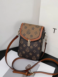 Vintage patterned crossbody phone bag with brown flap and adjustable leather strap