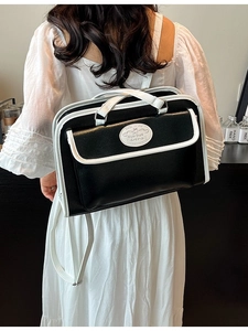 Sac à main rectangulaire contrasté noir et blanc avec bandoulière élégante pour femme