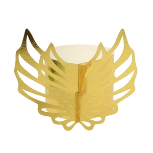 Detailed close-up of golden hollow butterfly wing napkin ring for wedding decor
