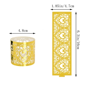 Detail view of heart pattern gold hollow paper napkin ring showing 16cm length dimension