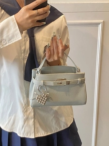 Classic light blue lychee pattern leather trapezoid handbag with silver heart charm accessory