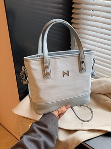 Women Fashion PU Leather Canvas Spliced Bucket Bag Vintage Metal Logo Handbag Casual Crossbody Bag Commute Tote Shoulder Bag