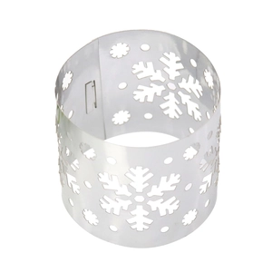 Detailed view of silver snowflake napkin ring with intricate cutout patterns and glossy finish