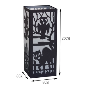 Detail view of black Halloween paper lantern with laser-cut owl and cat patterns 20cm