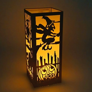 Halloween black hollow witch pumpkin paper lantern with yellow LED flickering candle light