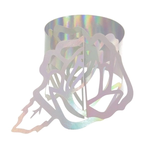 Detail of laser-cut rose paper napkin ring with iridescent laser rainbow coating finish