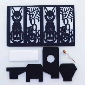 Laser-cut Halloween paper lamp kit with spooky black cat, spider web and pumpkin motifs