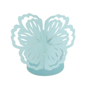 Pearly light blue laser cut butterfly paper cupcake wrappers for wedding table decor