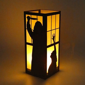 Halloween horror movie silhouette lantern with warm glowing Michael Myers design
